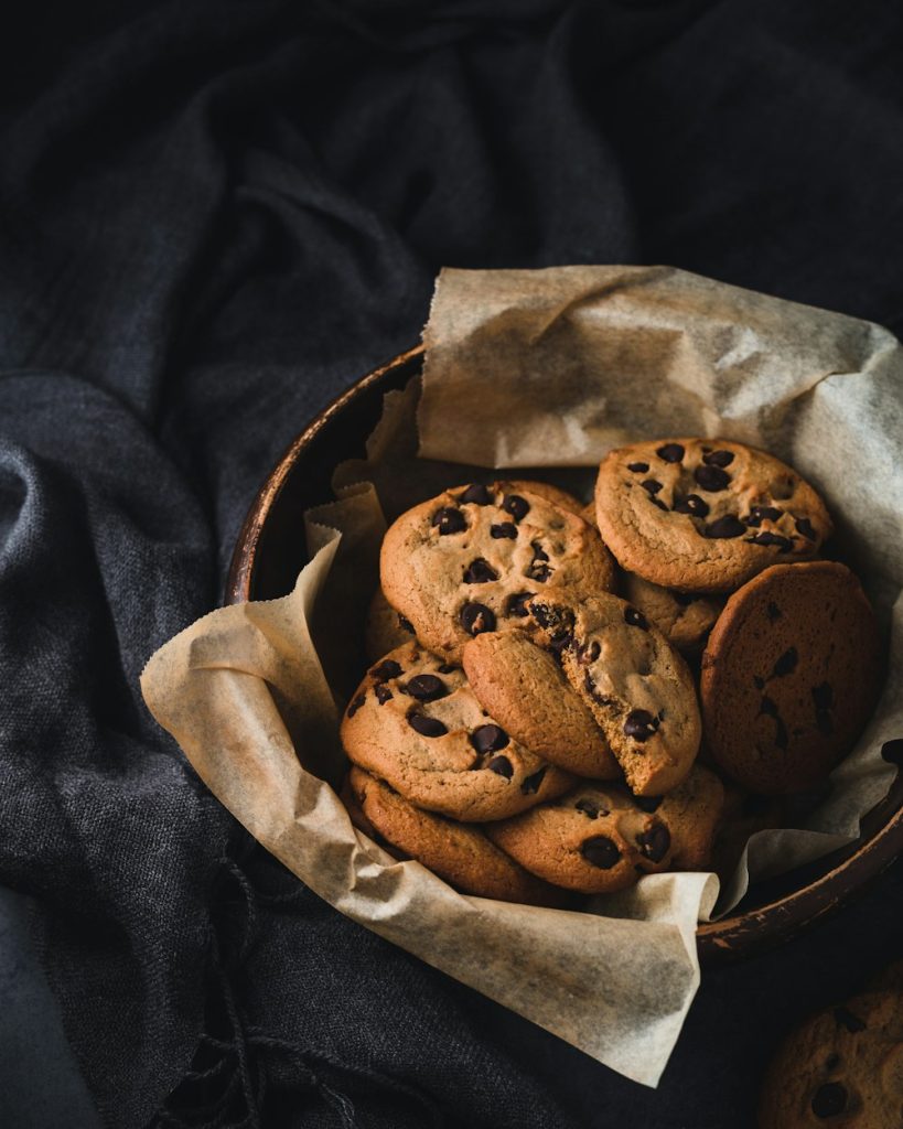 Brown cookies piled in a round bowl